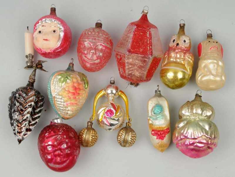 Appraisal: Lot of Christmas Ornaments Description Includes child's face with glass