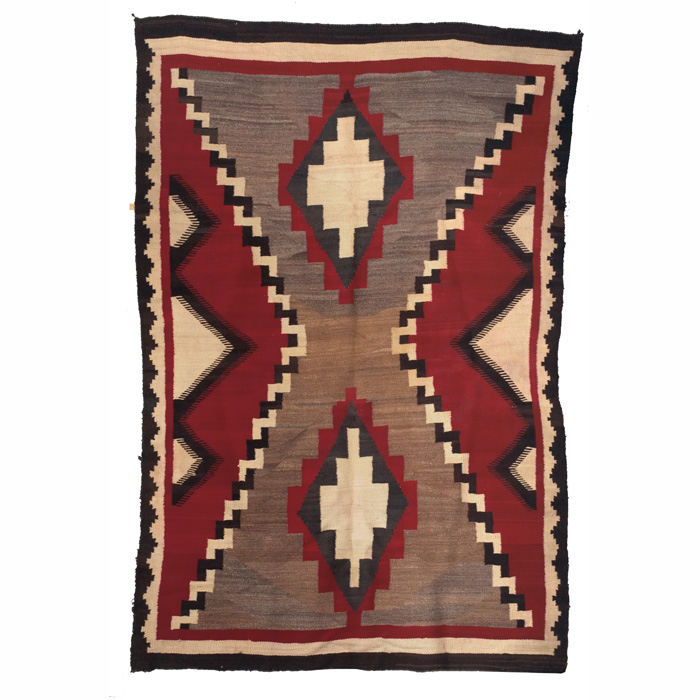 Appraisal: Navajo rug c diamond pattern in red tan and brown