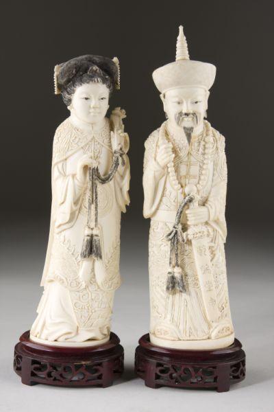 Appraisal: Pair of Antique Chinese Ivory Figures standing depictions of an