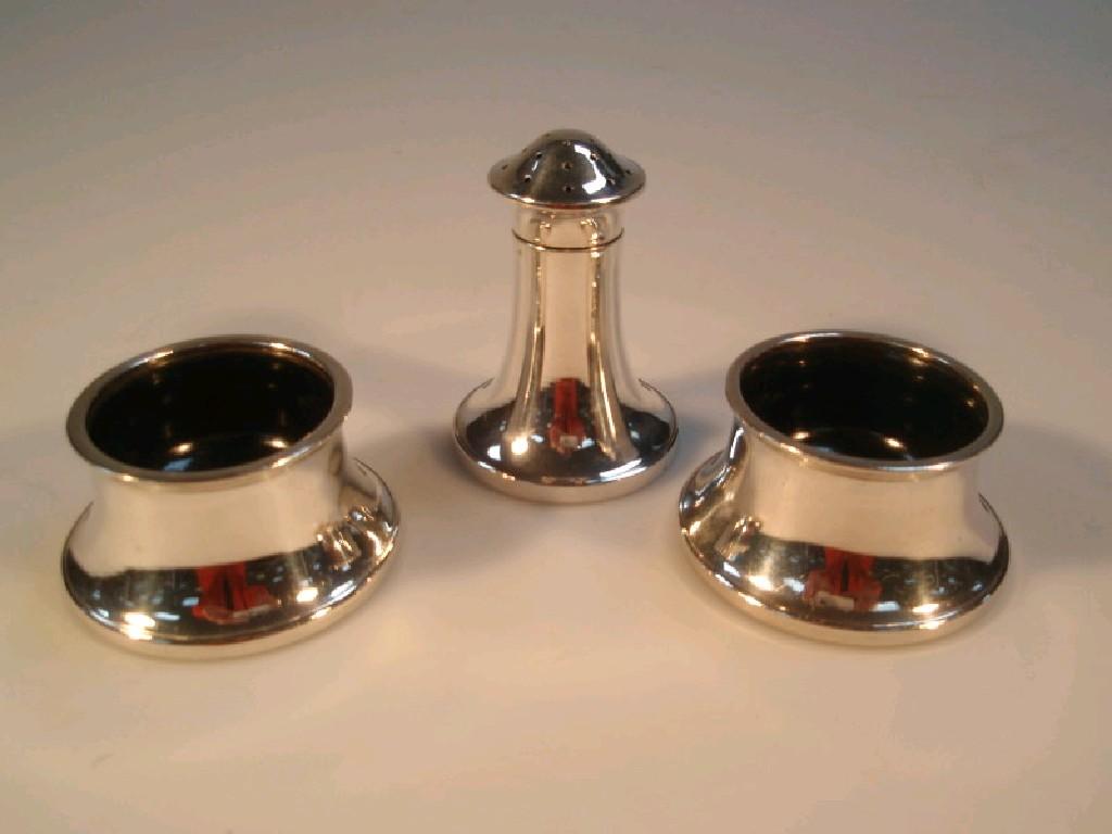 Appraisal: A George VI silver three-piece cruet set Birmingham of circular