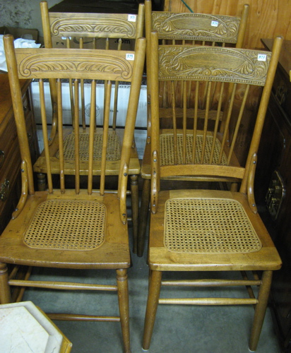 Appraisal: TWO PAIRS OF SPINDLE-BACK DINING CHAIRS American c the four