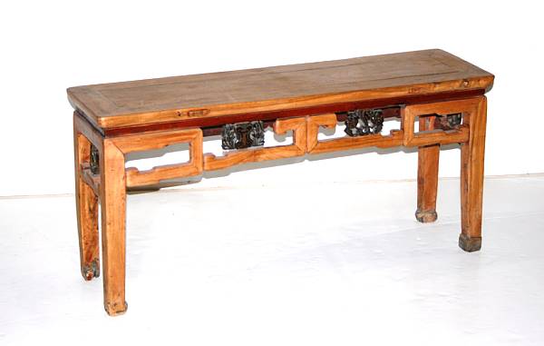 Appraisal: A Chinese softwood bench With architectural panel decoration traces of