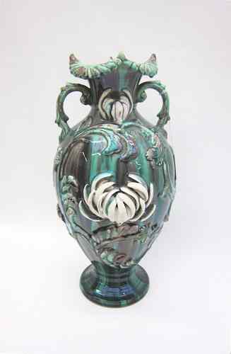 Appraisal: AMERICAN MAJOLICA DOUBLE HANDLED VASE with white spider dahlia leafage