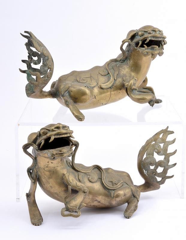 Appraisal: Pair of Chinese brass playful Fu dogs l Pair of