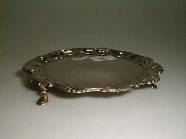 Appraisal: A George III silver card tray with a pie crust