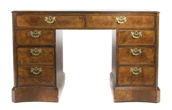 Appraisal: An English Bow Front Desk th century having walnut veneer