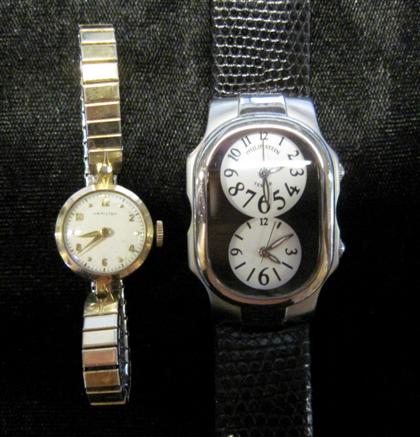 Appraisal: Two lady's wristwatches One gold toned circular case white enamel