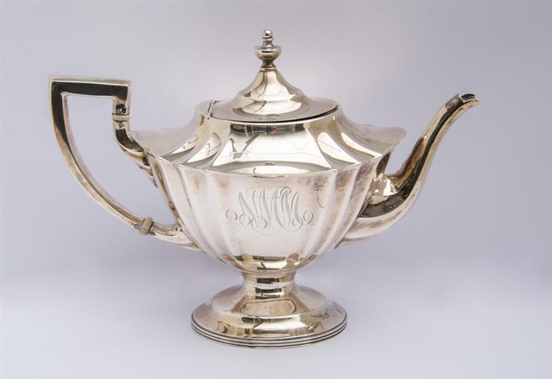 Appraisal: MAUSER MONOGRAMMED SILVER TEAPOT AND AN AMERICAN TWO-PIECE CREAMER AND