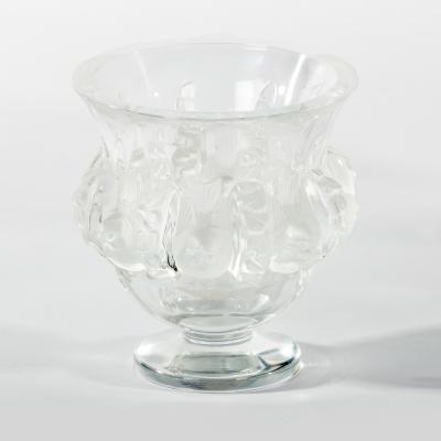 Appraisal: Style of Lalique a glass vase with bird decoration cm