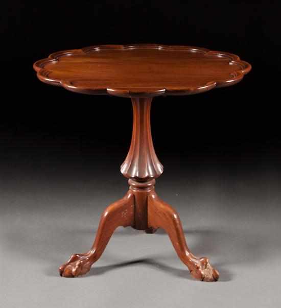 Appraisal: Chippendale style carved mahogany tilt-top piecrust tea table th century