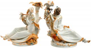 Appraisal: A PAIR OF PORCELAIN FIGURES OF A MOOR WITH PARROT