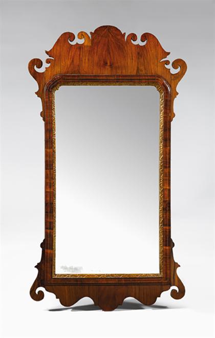 Appraisal: Chippendale mahogany looking glass The shaped crest flanked by scrolled