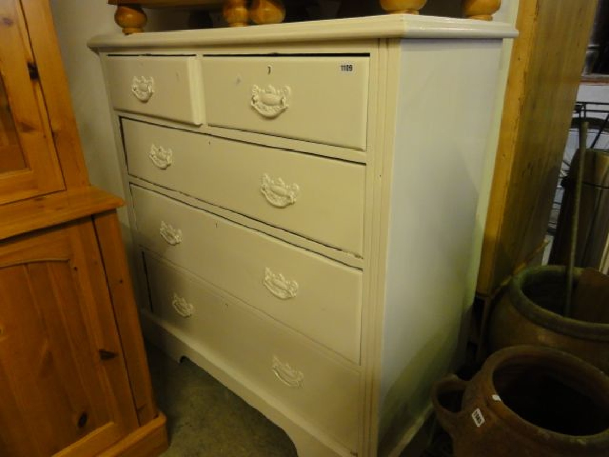 Appraisal: An Edwardian pine bedroom chest of three long and two