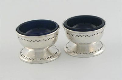 Appraisal: Liberty Co A pair of modern circular salts with a