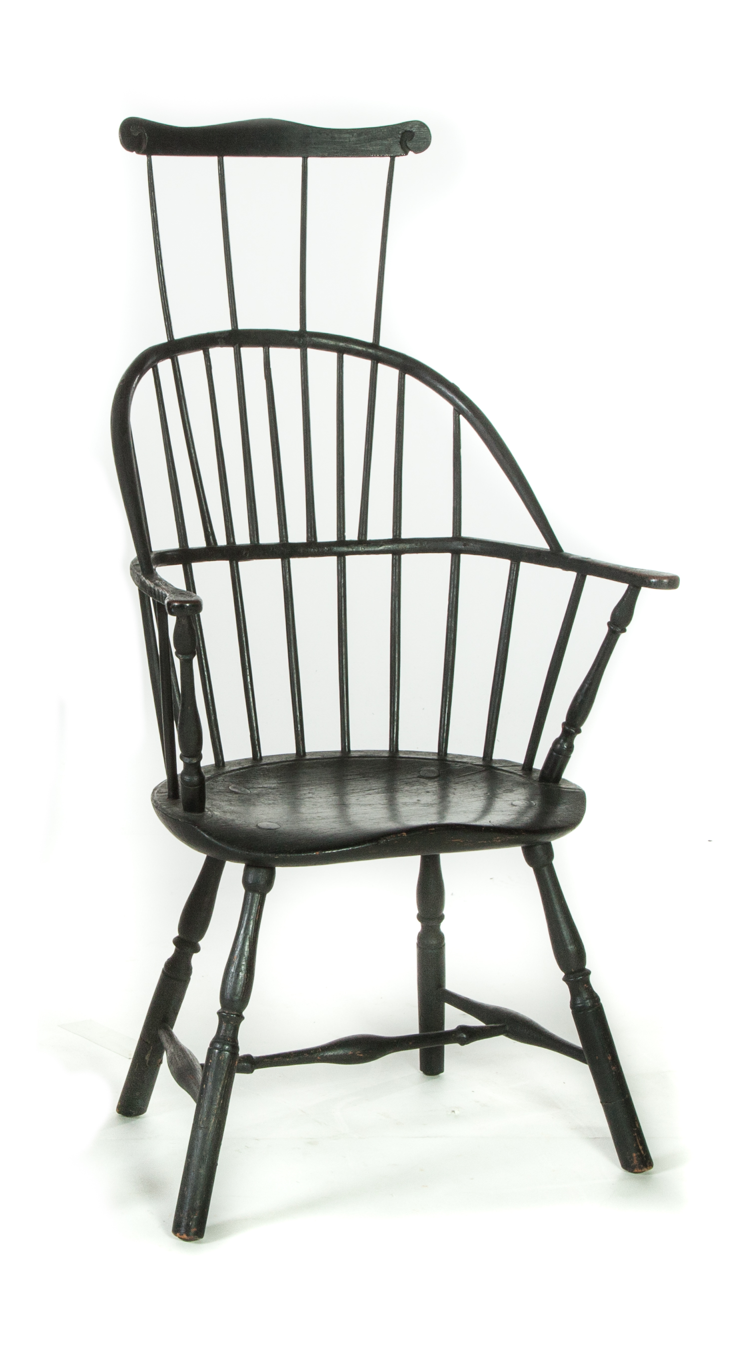 Appraisal: PAINTED COMB BACK WINDSOR ARMCHAIR American ca Black paint with