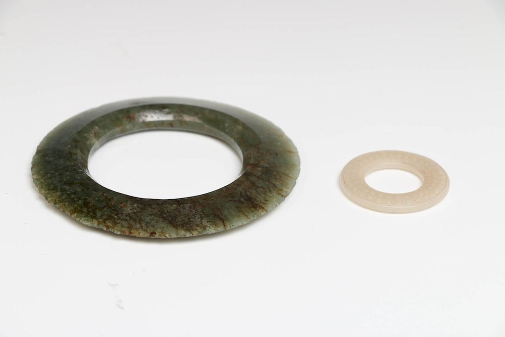 Appraisal: GROUP OF TWO JADE BI DISC HAN WARRING STATE P