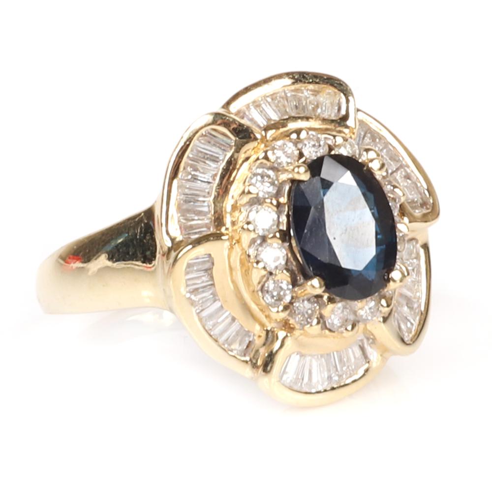 Appraisal: SAPPHIRE AND DIAMOND K YELLOW GOLD RING WITH RETRO STYLE