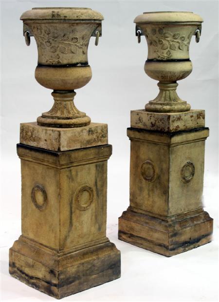 Appraisal: A pair of th century Hurlford terracotta garden urns and