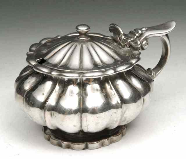 Appraisal: A GEORGE IV SILVER MUSTARD POT gourd shaped with matching