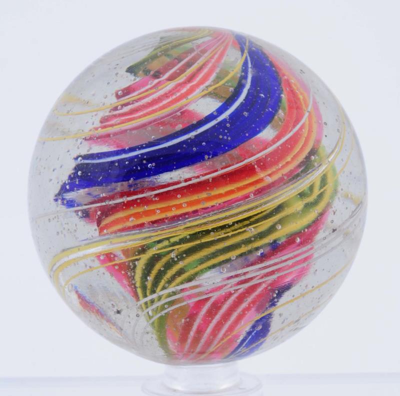 Appraisal: Large Divided Core Swirl Marble Nice twist of a multicolor