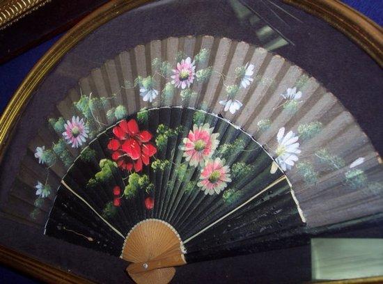 Appraisal: A framed fan and two Victorian painted photographs in rosewood