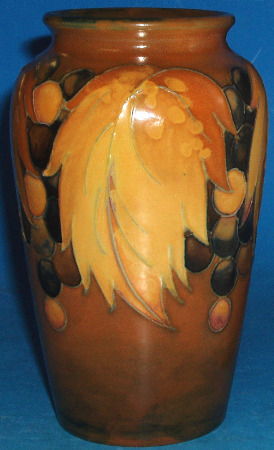 Appraisal: Moorcroft Salt Glazed Vase Decorated In The Leaf and Berry