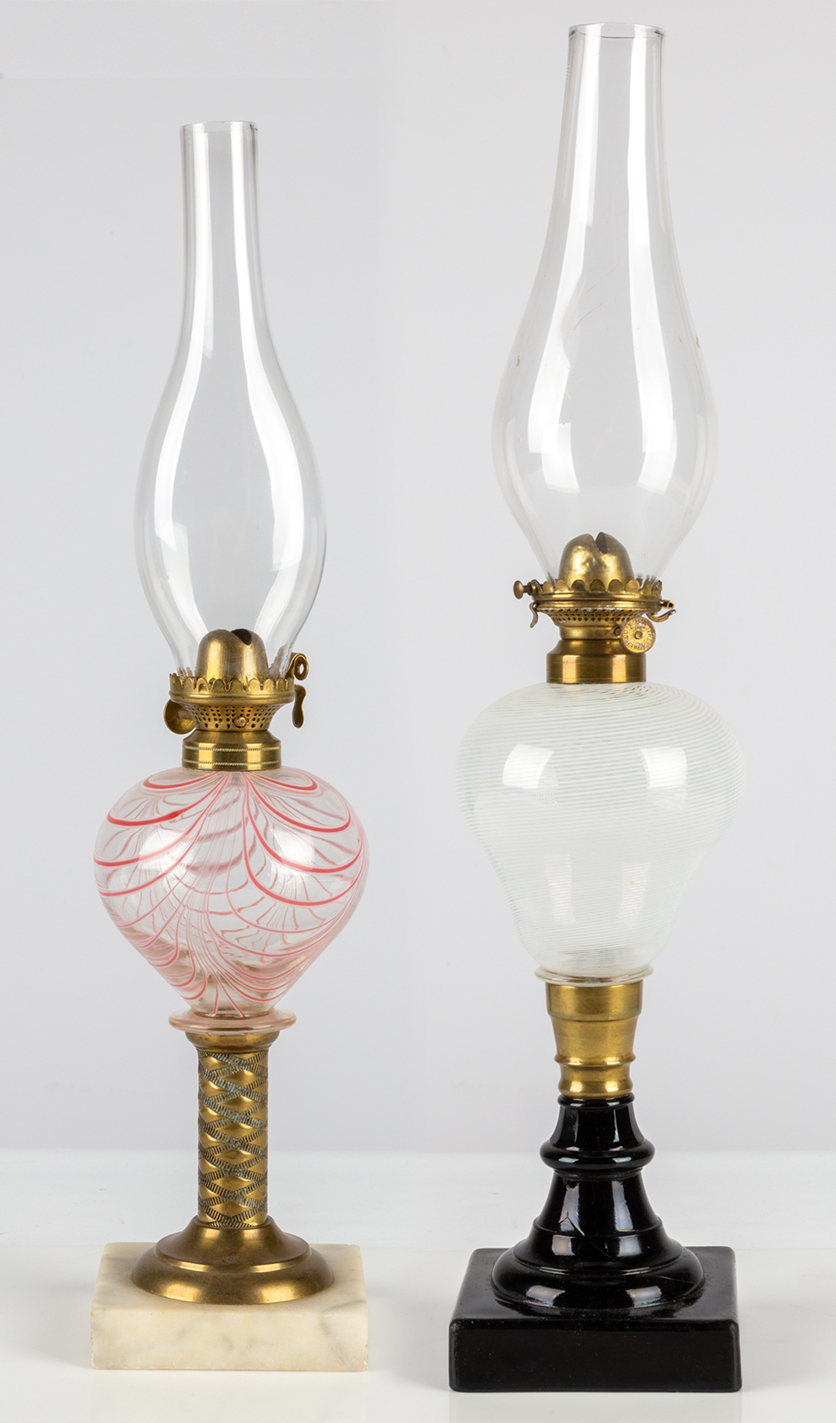 Appraisal: TH CENTURY OIL LAMPS Boston and Sandwich Glass Co Pink