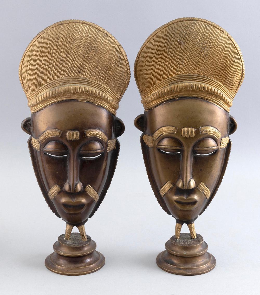 Appraisal: PAIR OF BRONZE SCULPTURES OF AFRICAN TRIBAL MASKS TH CENTURY