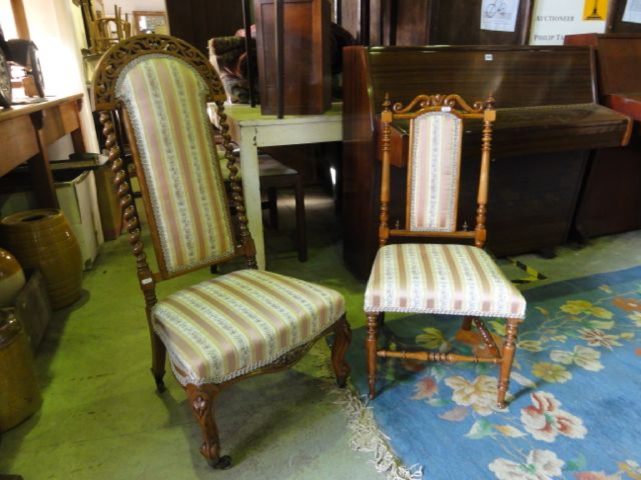 Appraisal: A Victorian walnut nursing chair with alternating striped upholstered seat