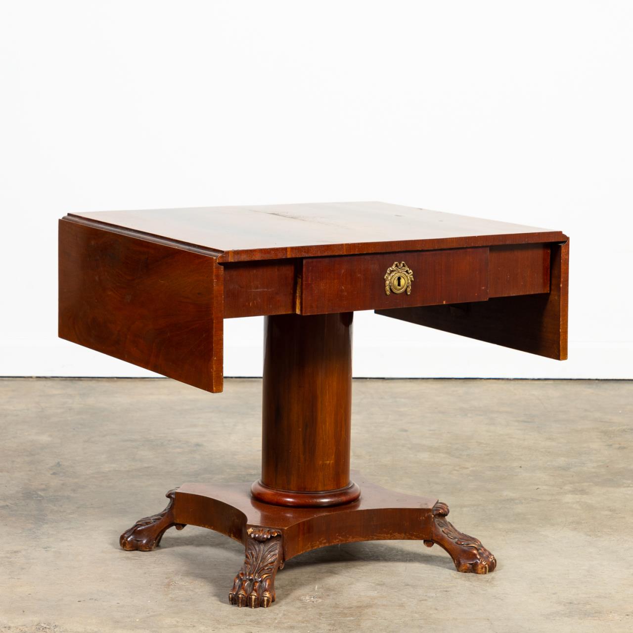 Appraisal: EMPIRE-STYLE MAHOGANY SOFA TABLE Continental th century mahogany and mahogany