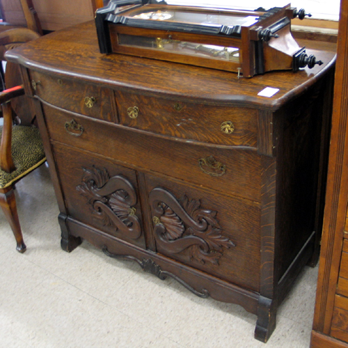 Appraisal: A VICTORIAN DARK OAK BUFFET American late th century The