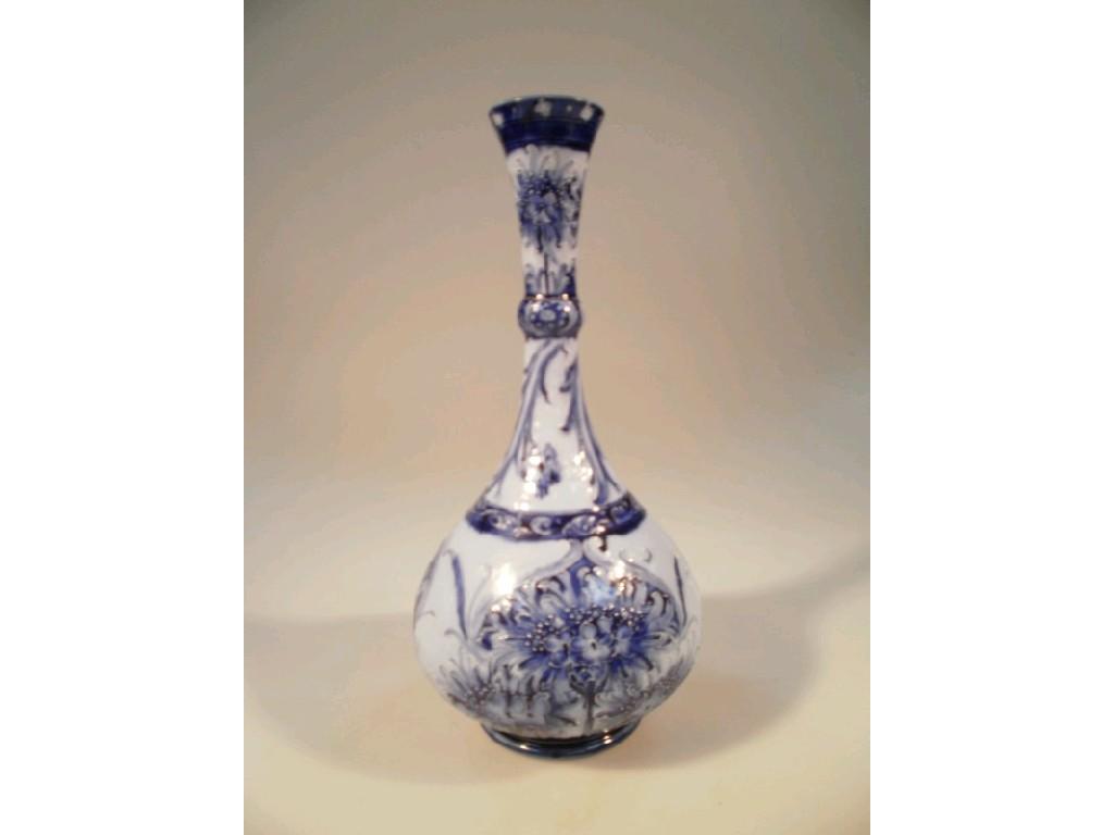 Appraisal: A Moorcroft MacIntyre Florian ware bottle vase the slightly flared