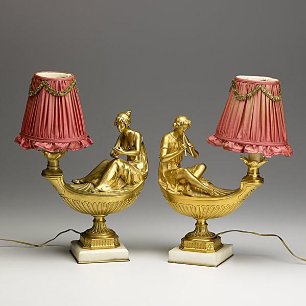 Appraisal: PAIR OF DORE BRONZE FIGURAL LAMPSAladdin type design marble bases