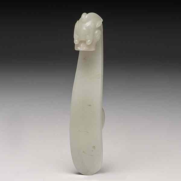 Appraisal: Chinese White Jade Garment Hook Chinese th century A white