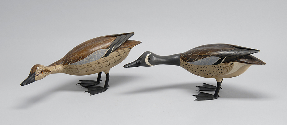 Appraisal: PAIR OF BLUE-WINGED TEAL CARVINGS By Charles Moore and Virgil