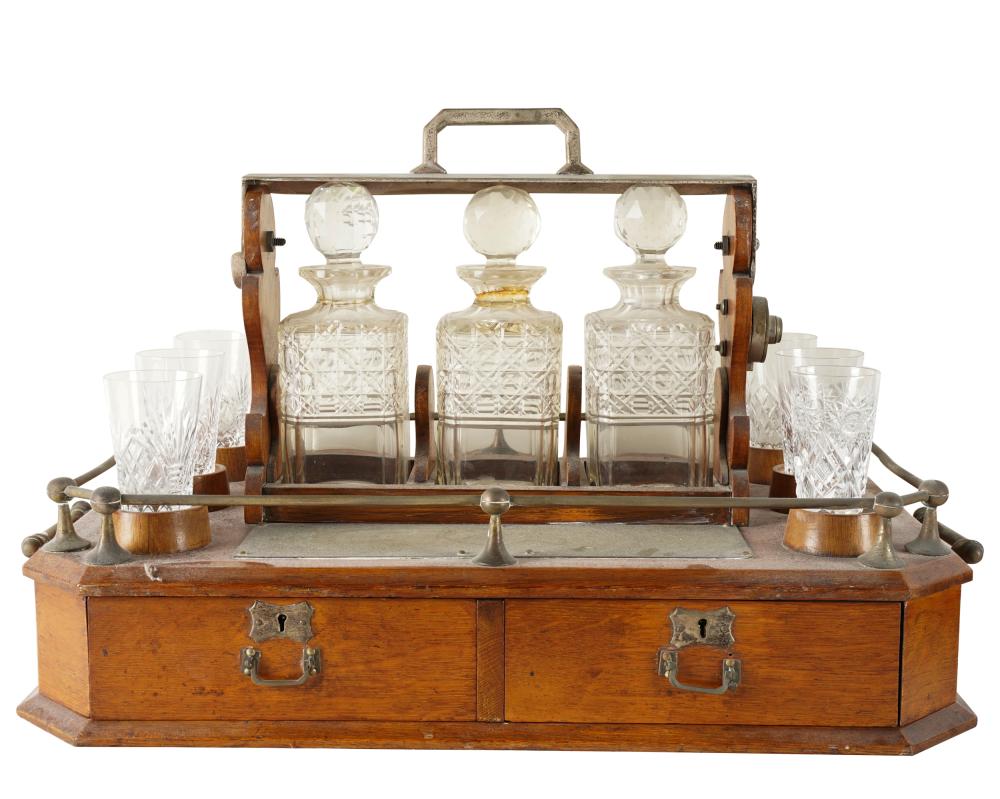 Appraisal: TANTALUS SETwith three cut-glass decanters and six glasses inches wide