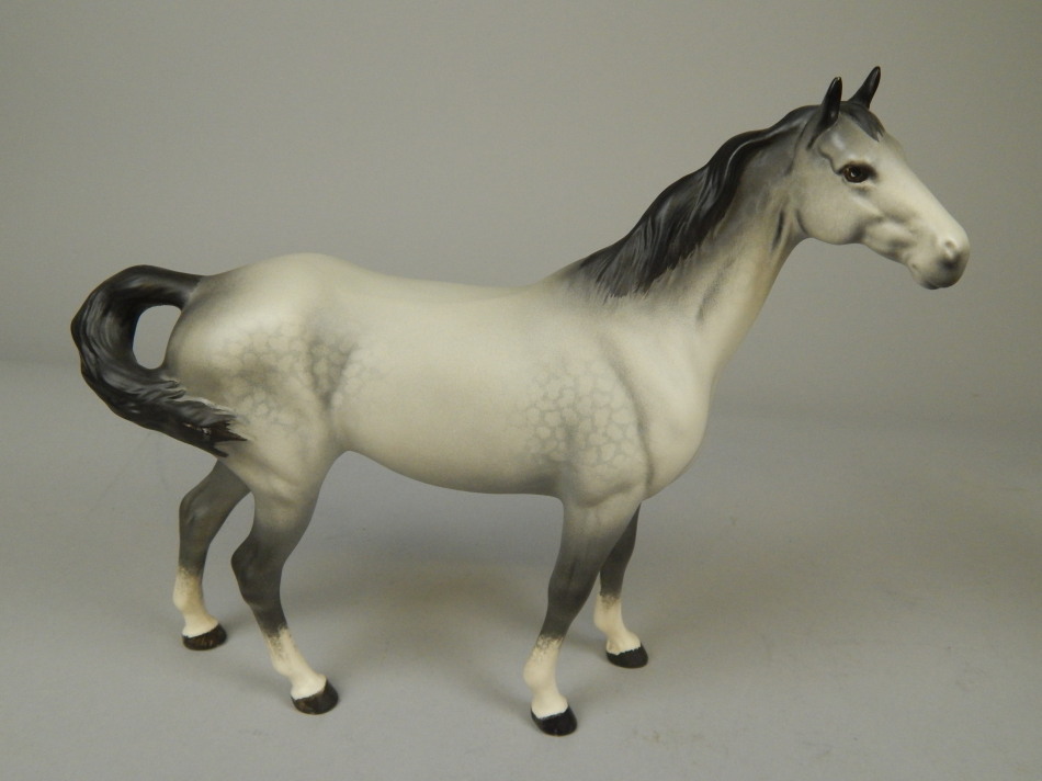 Appraisal: A Beswick figure of a horse in grey spotted matt