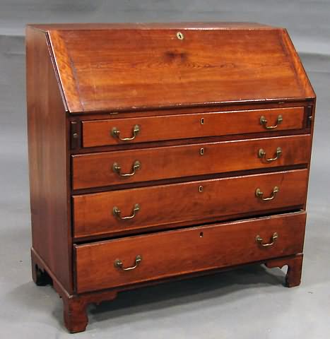 Appraisal: Fitted interior graduated thumb-molded drawers twin lopers bracket feet S