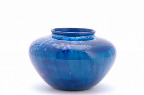 Appraisal: ADELAIDE ROBINEAU Squat porcelain vase covered in a fine cobalt