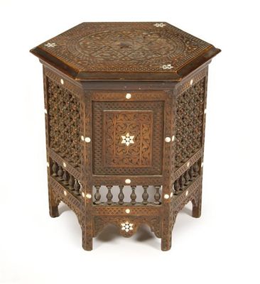 Appraisal: A Moroccan inlaid table hexagonal section inset with mother of