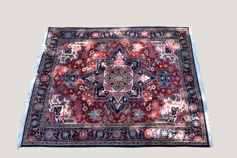 Appraisal: CONTEMPORARY PERSIAN STYLE HERIZ CARPETThe red and white center field