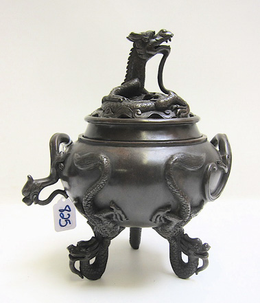 Appraisal: CHINESE BRONZE CENSER having dragon finial feet and handles Chop