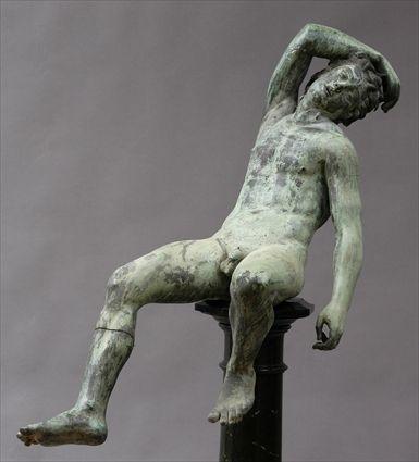 Appraisal: BRONZE FIGURE OF A SLEEPING SATYR AFTER THE ANTIQUE Modeled