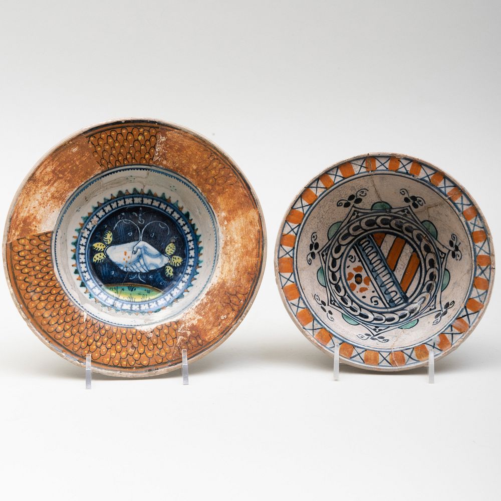 Appraisal: Two Contientnal Polychromed Majolica Bowls The first decorated with clasping