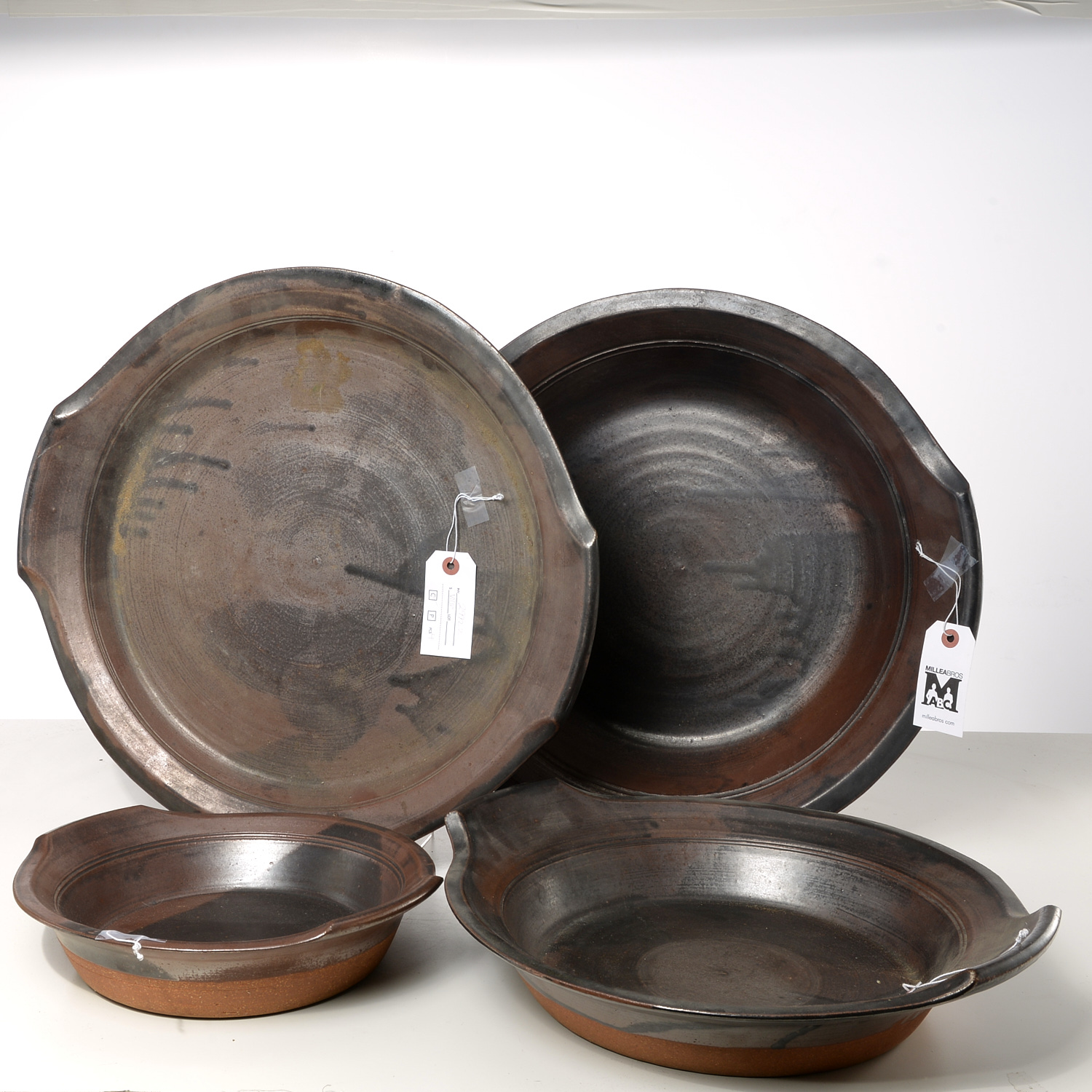 Appraisal: R BOWER SET GLAZED FLAMEWARE DISHES th c ceramic serving