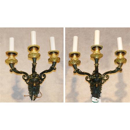 Appraisal: Pair of Empire Style Gilt and Patinated-Bronze Three-Light Sconces Estimate