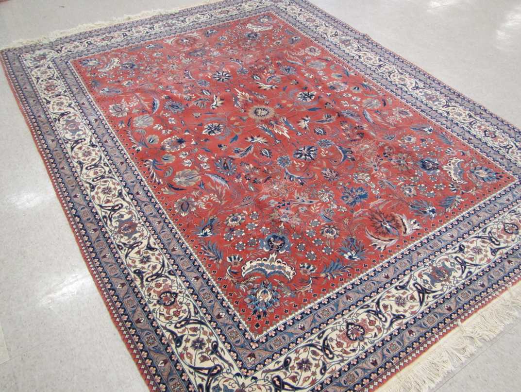 Appraisal: HAND KNOTTED ORIENTAL CARPET Sino-Persian Isfahan floral design on rose