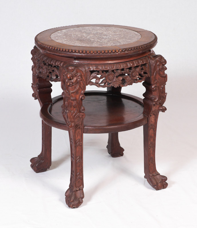 Appraisal: ORIENTAL CARVED MARBLE TOP JARDINIERE STAND Round inset marble top