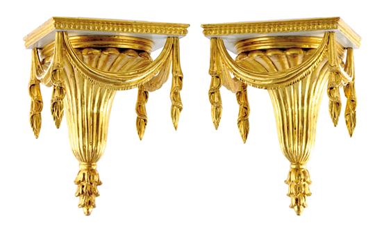 Appraisal: Pair carved giltwood brackets bellfower pendant issuing reeded trumpet surmounting