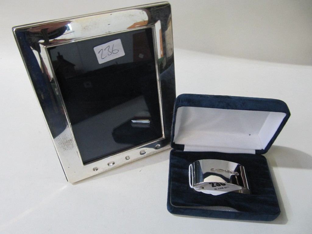 Appraisal: Lot comprising modern silver mounted photo frame and a modern